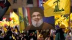 Chân dung của thủ lĩnh Hezbollah Sayyed Hassan Nasrallah trong một chiến dịch tranh cử ở vùng ngoại ô phía nam Beirut, Lebanon, ngày 10/5/2022. Ông Nasrallah bị giết chết trong cuộc không kích của Israel hôm 27/9/2024.