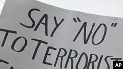 Protesters converged on a high school in Sterling, Illinois where a state commission was holding a public meeting on the possible sale of a prison