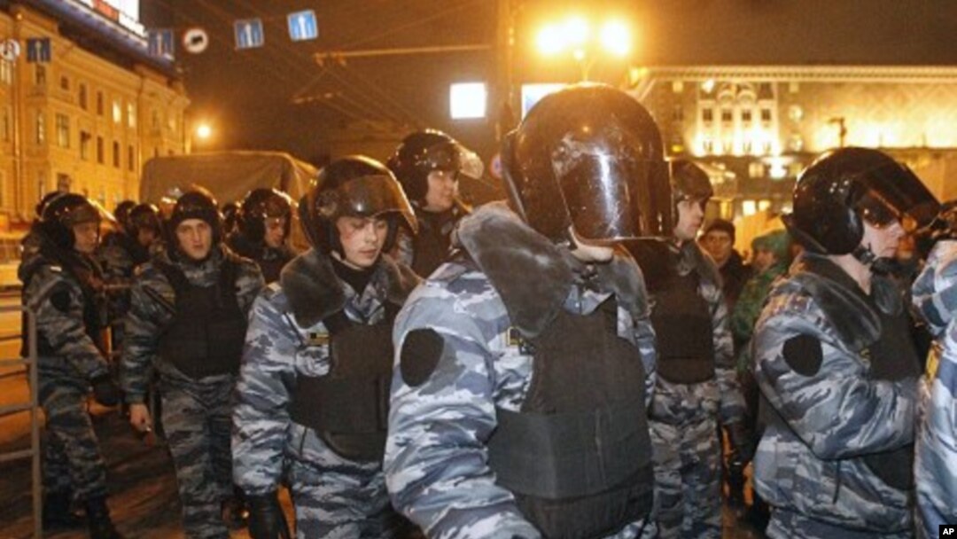 Police arrive at Triumphal Square during protests against alleged vote rigging in Russia's parliamentary elections in Moscow, Russia, December 6, 2011.