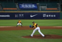 Chinatrust Brothers players during a game against Fubon Guardians with no audience at Xinzhuang Baseball Stadium in New Taipei City, Taiwan, April 24, 2020.