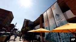 Pedestrians walk down Fountain Avenue in Springfield, Ohio, Sept. 11, 2024. Local officials announced that a two-day CultureFest that was to have started in the city Sept. 27 is being canceled because of threats and safety concerns.