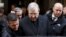 FILE - Australian Cardinal George Pell leaves at the end of a meeting with the victims of sex abuse, at the Quirinale hotel in Rome, Italy, March 3, 2016.