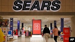 Shoppers walk into a Sears store in Pittsburgh, Pennsylvania, Feb. 8, 2017. 
