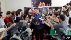 Brazil's presidential candidate for the Workers Party Fernando Haddad speaks with journalists in Sao Paulo, Brazil, Oct. 3, 2018. Brazil will hold general elections on Oct. 7. 
