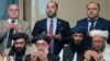 Archivo - El jefe político del Talibán, Sher Mohammad Abbas Stanikzai, (segundo desde la izquierda en la primera fila)Abdul Salam Hanafi y otros funcionarios del Talián oran durante conversaciones en Moscú, Rusia, el 6 de febrero de 2019.