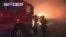 VOA60 America - hot and windy conditions are causing wildfires to spread through northern Los Angeles