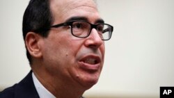 Treasury Secretary Steven Mnuchin speaks to the House Financial Services Committee, July 12, 2018, on Capitol Hill in Washington.