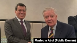 سیناتۆر گراهام و ژەنەڕاڵ مەزڵوم عەبدی.