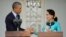 U.S. President Barack Obama, left, and Myanmar's opposition leader Aung San Suu Kyi shake hands during a news conference at her home in Yangon, Myanmar, Nov. 14, 2014.