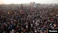 FILE - Supporters of former Pakistani Prime Minister Imran Khan's party, the Pakistan Tehreek-e-Insaf, protest what they call a stolen mandate in last year's general election, during a rally in Swabi, Pakistan, on Feb. 8, 2025.