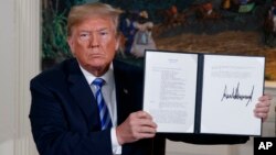 President Donald Trump deliveris a statement on the Iran nuclear deal from the Diplomatic Reception Room of the White House, May 8, 2018.