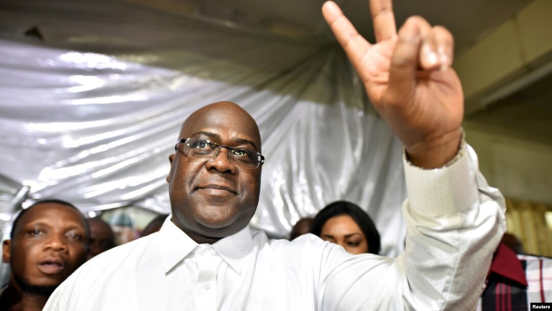 FILE - Felix Tshisekedi, leader of the Congolese main opposition party, was announced as the winner of the presidential elections. He gestures to his supporters at the party headquarters in Kinshasa, Democratic Republic of Congo, Jan. 10, 2019.
