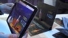 A piece of virtual mail is seen in a screenshot from video (E. Lee/VOA)