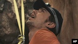 In '127 Hours,' actor James Franco portrays mountain climber Aron Ralston, who severed his own arm after getting trapped in an isolated canyon.