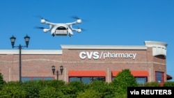 A UPS Flight Forward drone takes off during the first residential delivery of prescription medication for CVS in Cary, North Carolina, Nov. 1, 2019. 