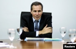 FILE - Argentine prosecutor Alberto Nisman speaks with journalists in Buenos Aires, Argentina, May 29, 2013. Picture taken May 29, 2013. Nisman was found dead hours before presenting evidence of a cover-up in the 1994 AMIA bombing.