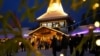 Tourists gather at Santa Claus Village, a winter-themed amusement park perched on the edge of the Arctic Circle, in Rovaniemi, Finland, Dec. 4, 2024. 