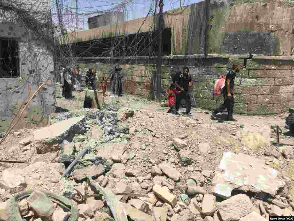 Much of the Old City of Mosul is in ruins as Iraqi civilians flee fighting between Iraqi forces and Islamic State militants, July 1, 2017.