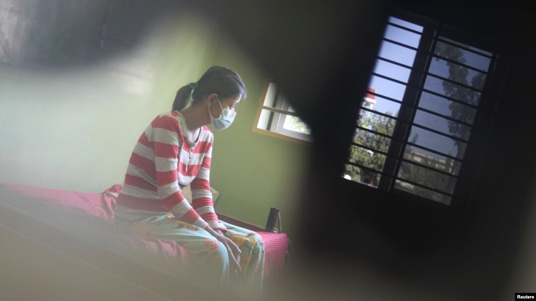 FILE - An HIV-positive patient rests at the Khmer-Soviet Hospital in Phnom Penh, Nov. 29, 2011.