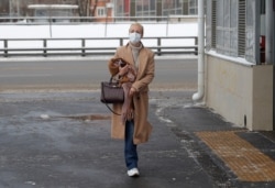 Yulia Navalnaya, wife of Russian opposition leader Alexei Navalny, arrives at a court building in Moscow, Feb. 1, 2021.