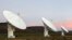 FILE - Radio telescope dishes of the KAT-7 Array at the proposed South African site for the Square Kilometre Array (SKA) telescope near Carnavon in the country's remote Northern Cape province, May 17, 2012. 