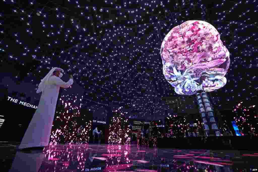 A visitor takes pictures inside the Russian Pavilion of Expo 2020, in Dubai, United Arab Emirates.
