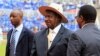 Uganda's President Yoweri Museveni (C) arrives at the national celebration to mark Kenya's Jamhuri Day (Independence Day) at the Nyayo Stadium in the capital Nairobi, Dec. 12, 2014.