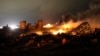 FILE - The remains of a fertilizer plant burn after an explosion at the plant in the town of West, near Waco, Texas, April 18, 2013.