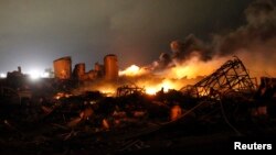 FILE - The remains of a fertilizer plant burn after an explosion at the plant in the town of West, near Waco, Texas, April 18, 2013.