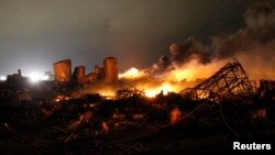 The remains of a fertilizer plant burn after an explosion at the plant in the town of West, near Waco, Texas, Apr. 18, 2013. 