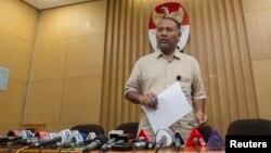 FILE - Bambang Widjojanto, former deputy chief of the Corruption Eradication Commission (KPK), is seen addressing the media in Jakarta.