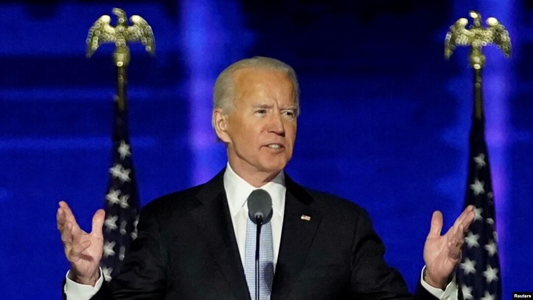 Democratic 2020 U.S. presidential nominee Joe Biden addresses supporters at an election rally, after news media announced that Biden has won the 2020 U.S. presidential election, in Wilmington, Delaware, Nov. 7, 2020.