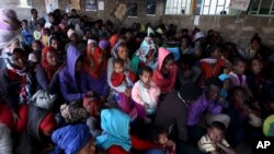 Eritrean refugees wait to get registered on arrival at the Indabaguna refugee reception and screening center in Tigrai region near the Eritrean border in Ethiopia, February 9, 2016.