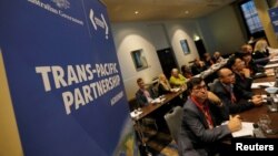 Delegates participate in the opening session of the Trans Pacific Partnership senior leaders meeting in Sydney, Australia, Aug. 28, 2017. 