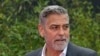 Aktor dan aktivis hak asasi manusia George Clooney di Duesseldorf, Jerman barat pada 24 Mei 2023. (Foto: INA FASSBENDER via REUTERS)