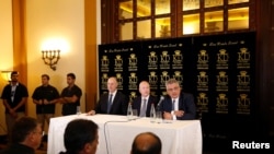 Jason Greenblatt (C), U.S. President Donald Trump's Middle East envoy, sits next to Tzachi Hanegbi (L), Israeli Minister of Regional Cooperation and Mazen Ghoneim, head of the Palestinian Water Authority, during a news conference in Jerusalem July 13, 2017. 