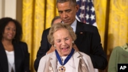 FILE - Then-President Barack Obama awards Ethel Kennedy the Presidential Medal of Freedom during a ceremony in the East Room of the White House in Washington, Nov. 24, 2014.