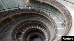 People visit the Vatican Museums at the Vatican on the day of its reopening after weeks of closure, as Italy eases COVID-19 restrictions.