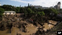 A destroyed flooded zoo area is seen in Tbilisi, Georgia, June 15, 2015. 