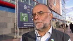 Environmentalists attending the Madrid climate talks, like Ramon Marti, support wind energy but worry badly sited farms could harm birds and bats. (Lisa Bryant/VOA)