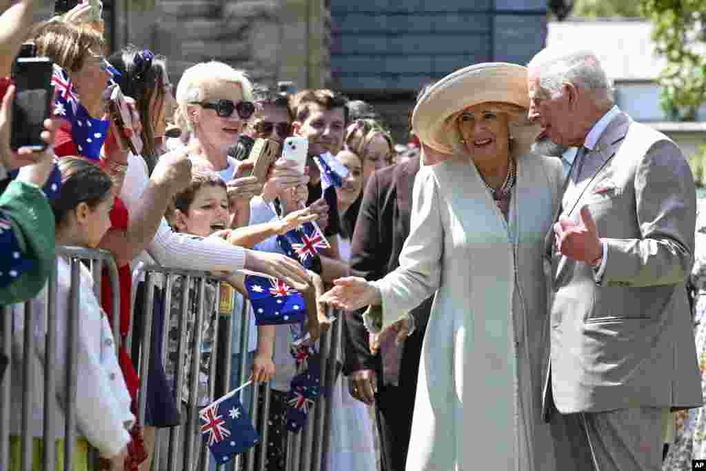 Britain&#39;s King Charles and Queen Camilla greet well wishers as they leave St Thomas&#39; Anglican Church in Sydney, Australia.