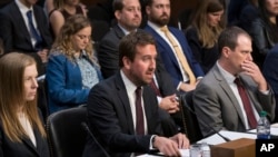 FILE - Nick Pickles, center, then-public policy director for Twitter, testifies before the Senate Commerce, Science and Transportation Committee on Sept. 18, 2019, on Capitol Hill in Washington. Pickles said on Nov. 20, 2024, that he is joining the company Tools for Humanity.