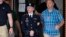 U.S. Army Pfc. Bradley Manning is escorted out of a courthouse in Fort Meade, Maryland, July 2, 2013, during the fifth week of his court-martial. 