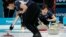 Japan's Chinami Yoshida shouts instructions to teammates during their women's curling match against China at the 2018 Winter Olympics in Gangneung, South Korea, Feb. 17, 2018.
