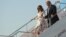 U.S. President Donald Trump and first lady Melania Trump arrive aboard Air Force One at Tokyo Haneda Airport in Tokyo, May 25, 2019.