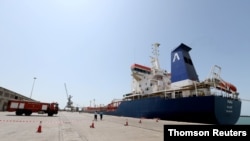 FILE - An oil tanker docks at the port of Hodeidah, Yemen, Oct. 17, 2019. 