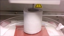 Hyperelastic Bone Being 3-D-printed Into Forms, Absorbing Liquid, Demonstrating Elasticity