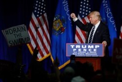 FILE - Republican presidential candidate Donald Trump campaign at the University of Wisconsin Eau Claire, Nov. 1, 2016, in Eau Claire, Wis.