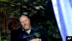 FILE - Danish cartoonist Kurt Westergaard is seen at his home near Aarhus, Denmark, June 6, 2010.