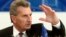 European Energy Commissioner Guenther Oettinger addresses a news conference in Vienna, June 16, 2014. 